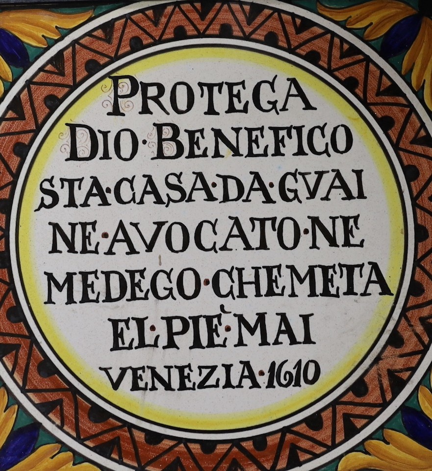 An Italian tile in hanging frame 27 x 27cm